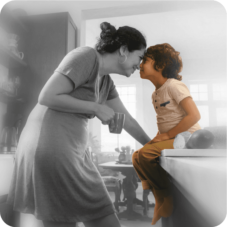 Mother and child sharing a moment in their home