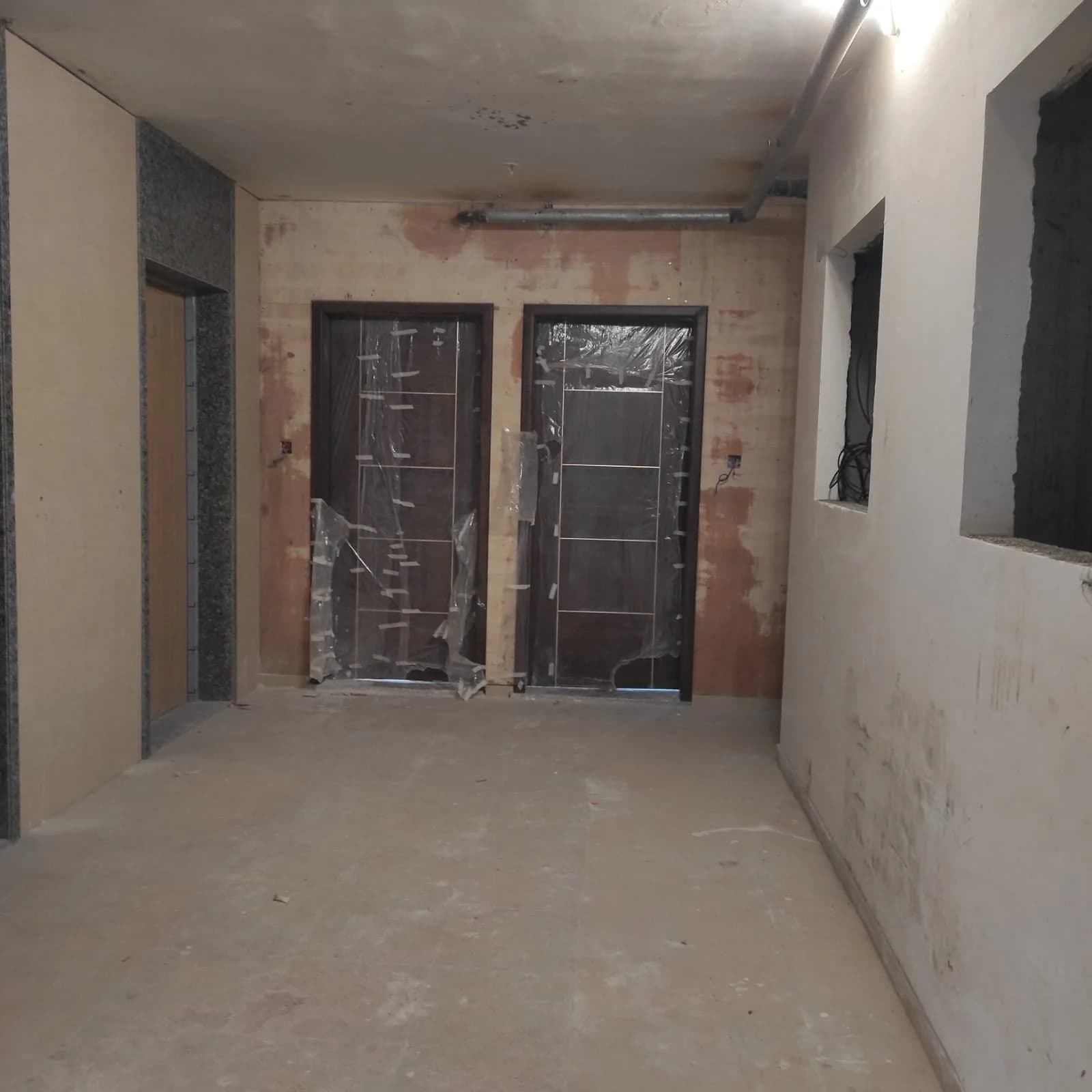 Main door fitting & panelling work